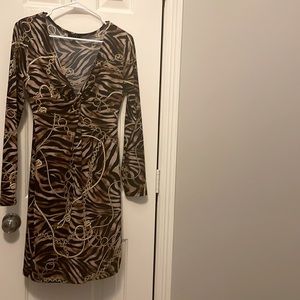 Leopard dress with cleavage cut in the front size 10